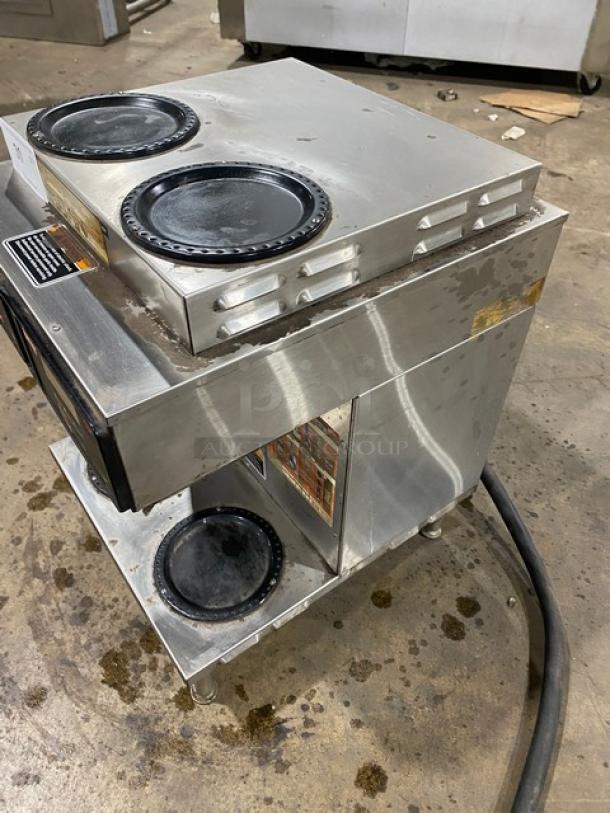 Bunn AXIOM22TWIN stainless steel twin coffee brewer, four warming plates, digital controls, on legs, used condition.