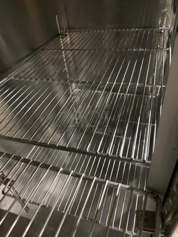 Leader commercial stainless steel 2-door refrigerated worktop lowboy, model LB48SC, with chrome-plated wire rack and glass sliding doors.