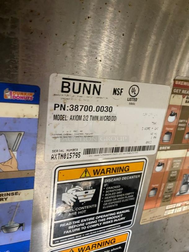 Bunn AXIOM2/2TWIN coffee brewer, stainless steel, digital controls, 4 warming plates, serial AXTN015795, used condition.