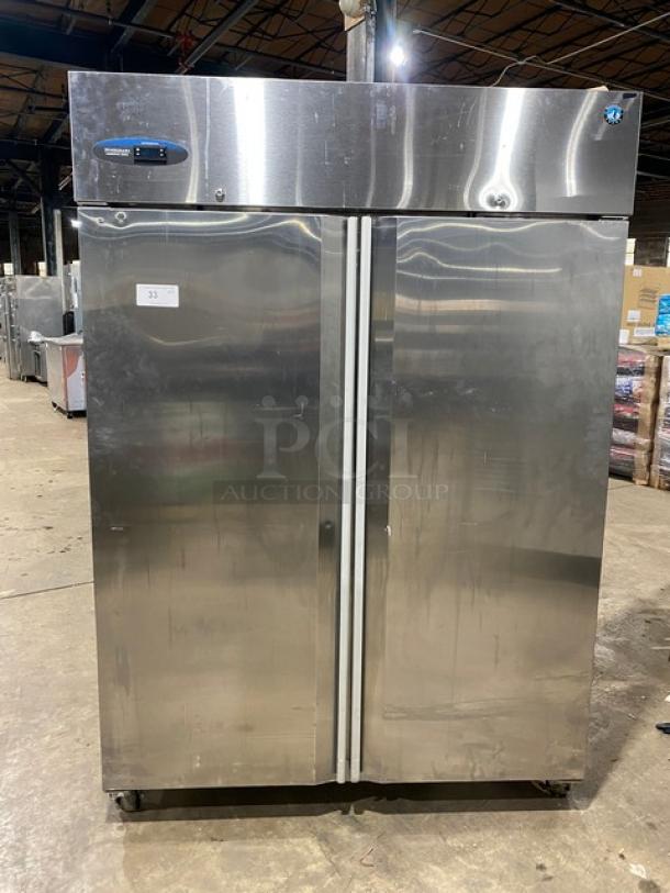 Hoshizaki CR2S-FS stainless steel 2-door reach-in refrigerator, Energy Star certified, poly coated racks, on casters.