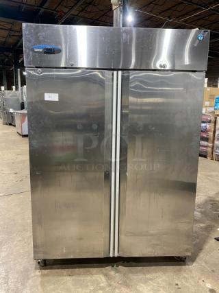 Hoshizaki CR2S-FS stainless steel 2-door reach-in refrigerator, Energy Star certified, poly coated racks, on casters.