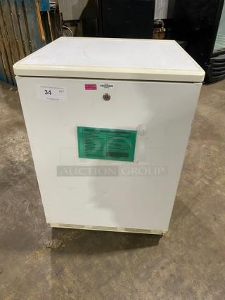 Fisher Scientific undercounter flammable storage, model 97-938-1, white, single door, with poly coated wire rack.