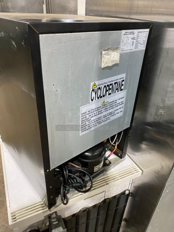 Antarctic BD-60-E compact upright freezer, 2020 model, black solid single door, poly-coated wire rack, 115V. Cyclopentane label.