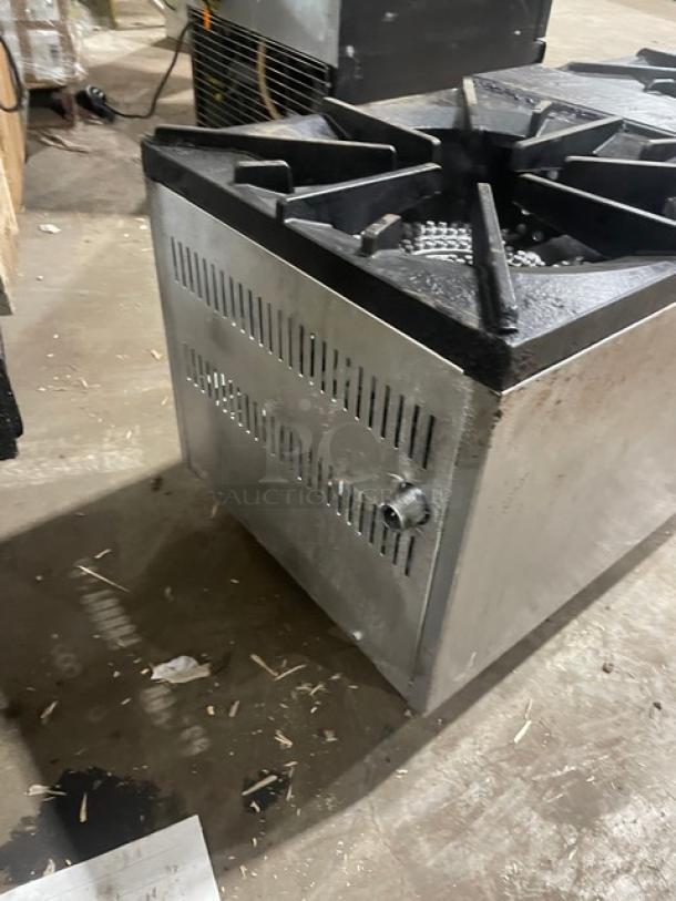 Cookline commercial stainless steel gas stock pot range with dual burners, sturdy legs, slight wear, ideal for high-volume kitchens.