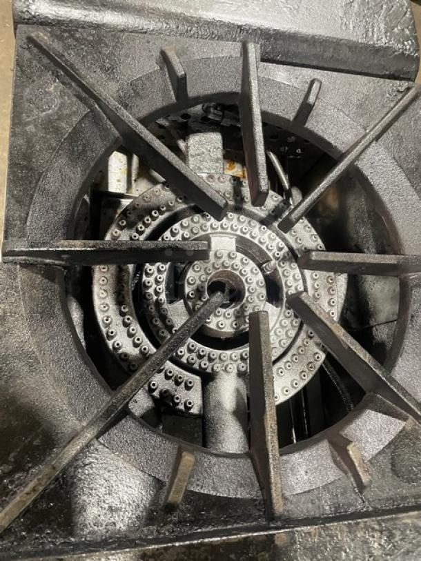 Cookline commercial stainless steel gas-powered stock pot range with durable cast iron grates, in used condition.
