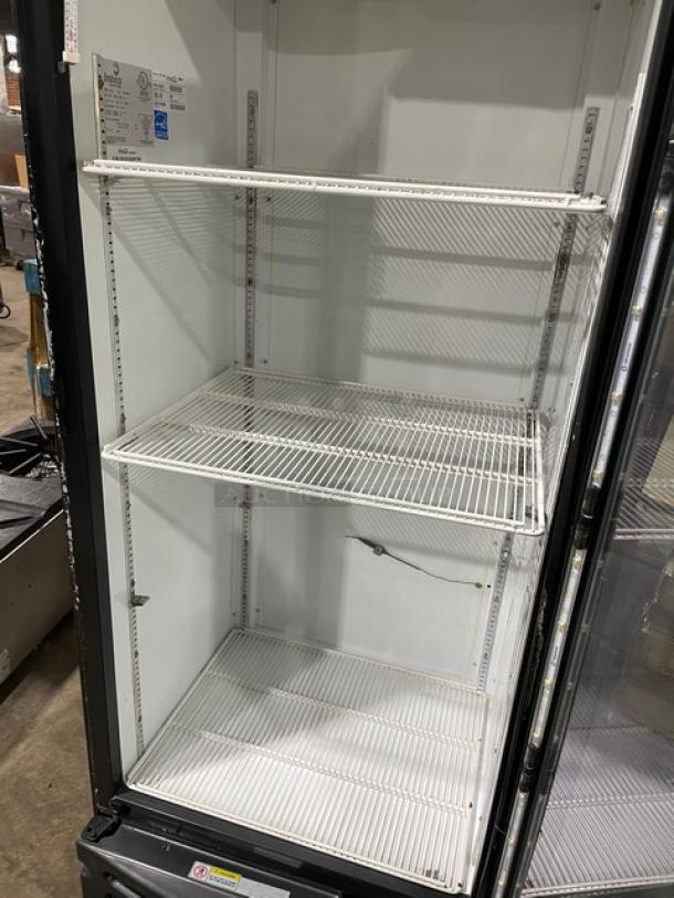 Imbera Elite Series G319 commercial refrigerator, black, single glass swing door, poly coated wired rack, Energy Star certified, on legs.