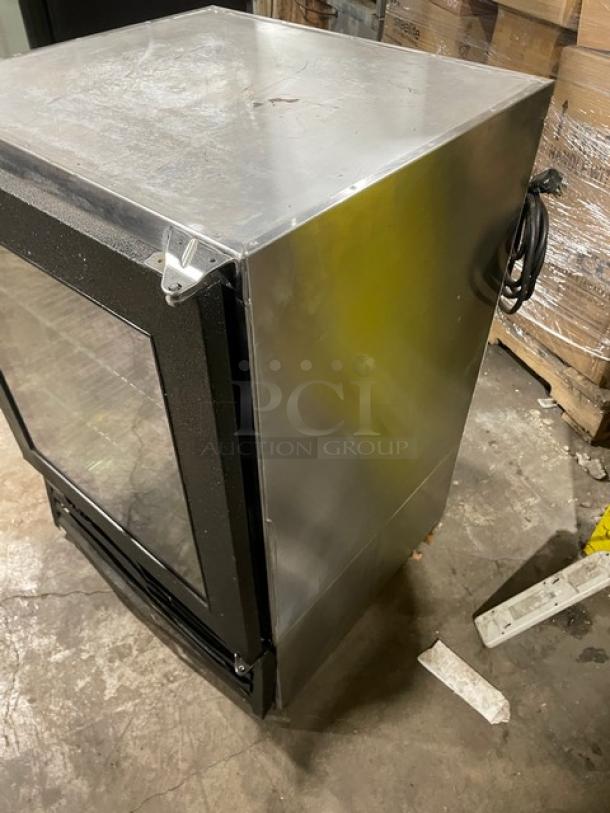 Glastender MFV24GNL mug chiller with stainless steel and black powder-coated finish, single glass door, poly coated rack.
