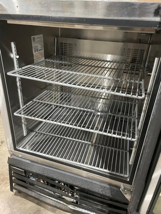 Commercial Glastender MFV24GNL mug chiller, stainless steel, single glass door, with poly coated wired rack, 120V, 1 phase.