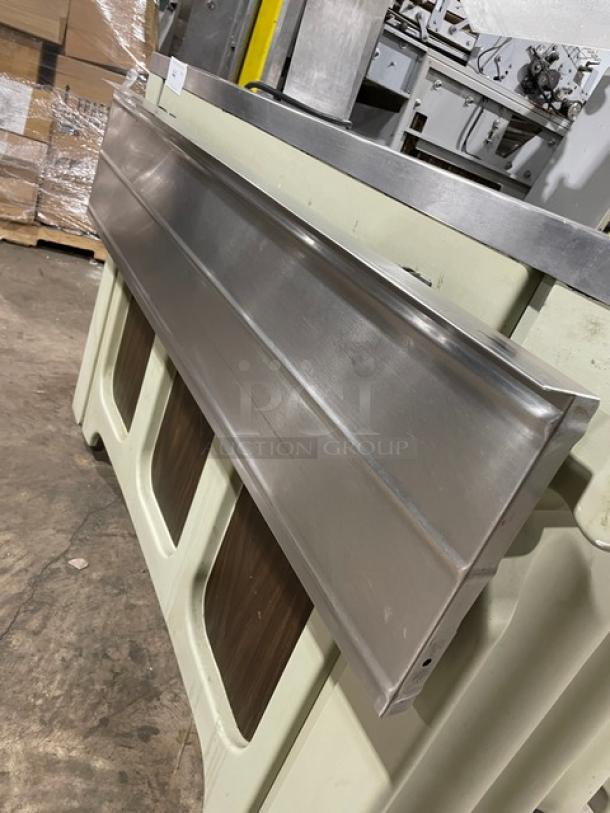 Custom stainless steel portable refrigerated salad bar with sneeze guard, folding tray slide, on casters, good condition.