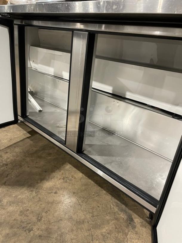 True TWT-72 commercial stainless steel 3-door worktop refrigerator, Energy Star certified, upturned backsplash, on casters.