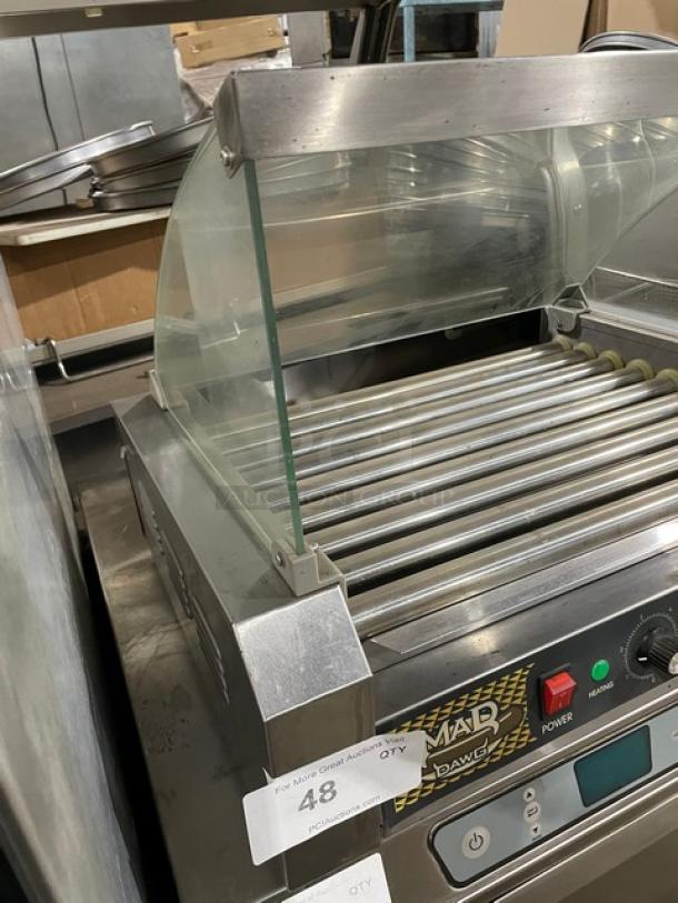 Great Northern Popcorn Mad Dog 4330 hotdog machine, 9-roller, stainless steel, with tempered glass sneeze guard, 120V.
