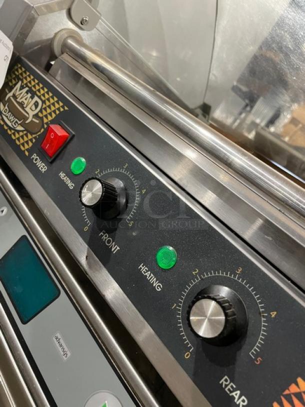 Great Northern Popcorn Mad Dog Series stainless steel 9-roller hotdog machine, Model 4330, with control knobs and sneeze guard.