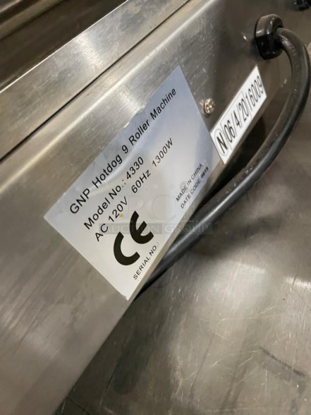 Great Northern Popcorn 4330 Hotdog Machine, stainless steel, 9-roller, tempered glass guard, 120V, commercial use, CE marked.