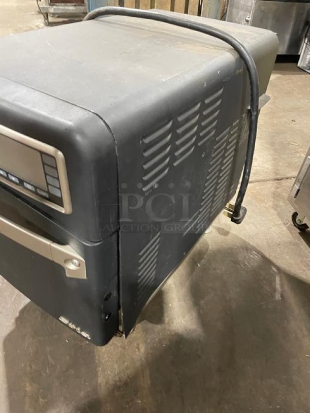 TurboChef Sota Series black commercial countertop oven, Model NGO, with digital controls, 208/240V, on legs, pre-owned.