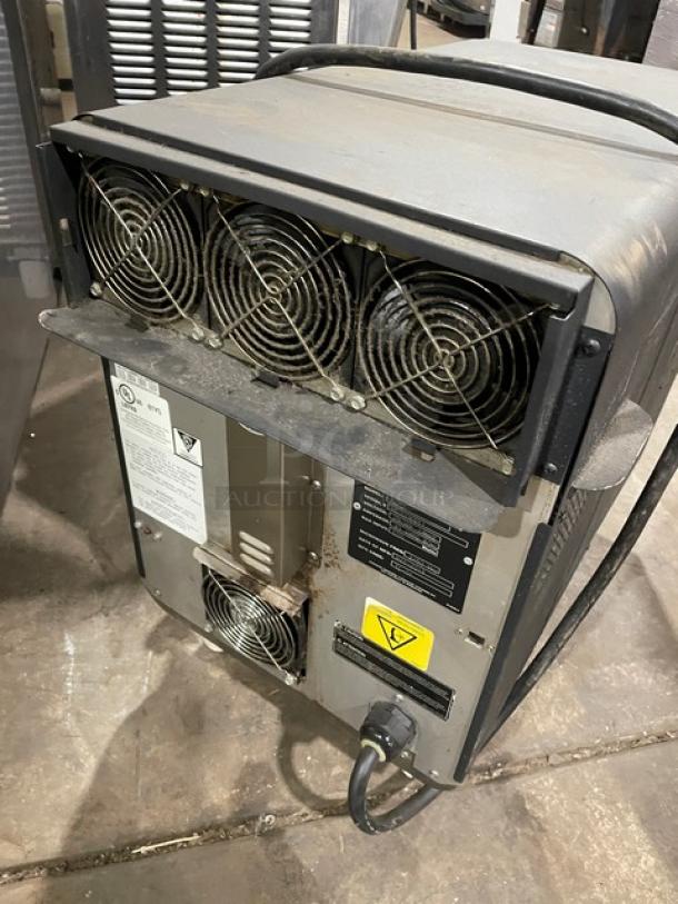 TurboChef Sota Series commercial oven, model NGO, black, electric, digital controls, 208/240V, on legs, rear view.