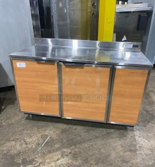 Duke RBC-60M stainless steel 2-door worktop refrigerator with up-turned backsplash, on legs, model SN: 09135680, 120V.