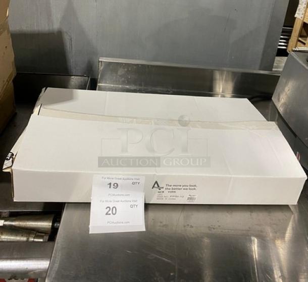 New Adcraft Titan Series 12" commercial stainless steel frying pan, model FPSI-12, in original packaging.