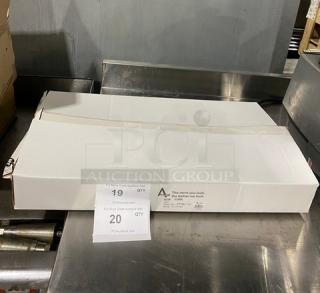 New Adcraft Titan Series 12" commercial stainless steel frying pan, model FPSI-12, in original packaging.