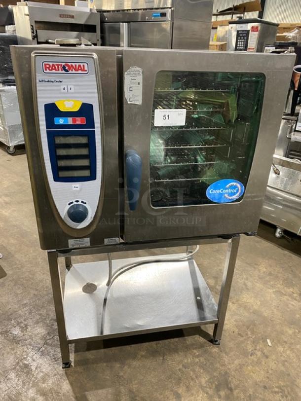 Rational SCC61 stainless steel combi convection oven, natural gas, 208V 3-phase, with single undershelf stand and wired oven rack.