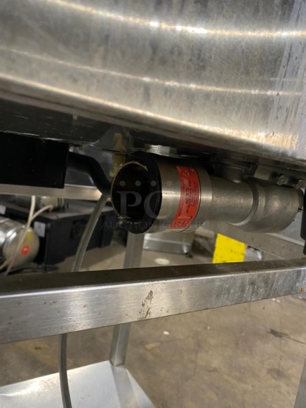 Rational SCC61 stainless steel combi convection oven with natural gas power, undershelf stand, and wired oven rack. 208V 3-phase.