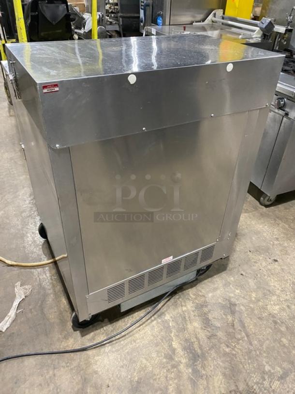 Beverage-Air SMF34 commercial stainless steel milk cooler on casters, single-access, electric, 115V, in good condition.