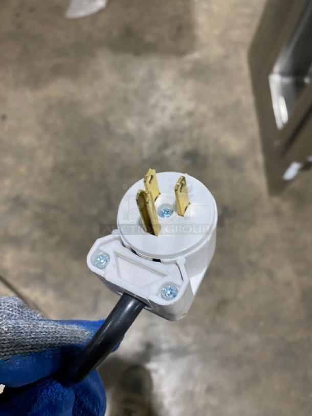 Beverage-Air SMF34 electric plug, stainless steel milk cooler, 115V, 1 phase, on casters, SN: 5705447.