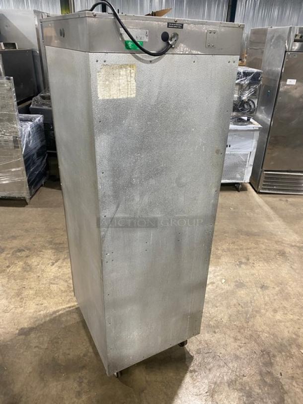 Alto-Shaam 1200UP stainless steel dual-compartment heated cabinet, on casters, individual controls, built-in rack, good condition.