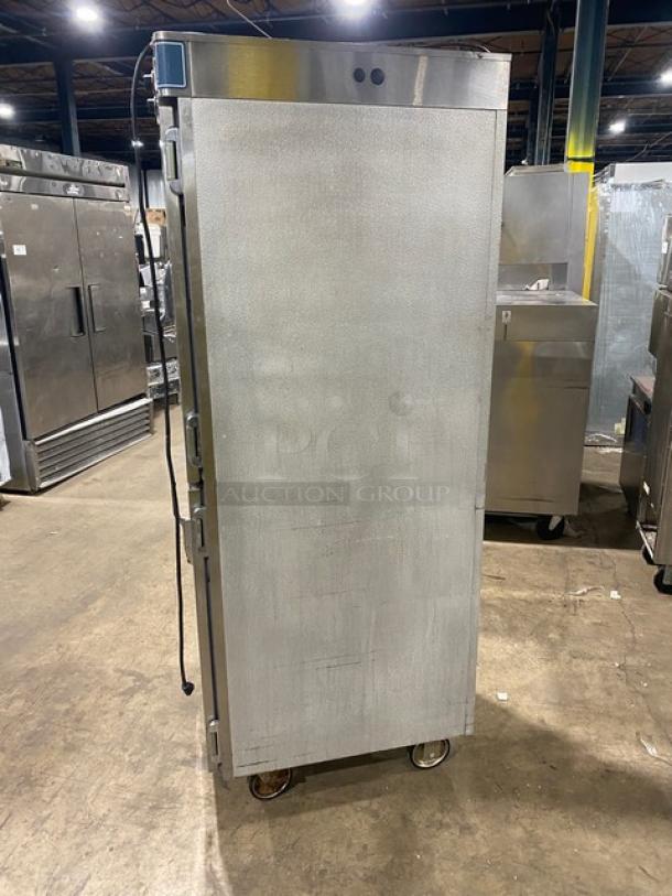 Alto-Shaam 1200UP commercial stainless steel heated holding/proofing cabinet with Dutch doors, dual compartments, on casters.