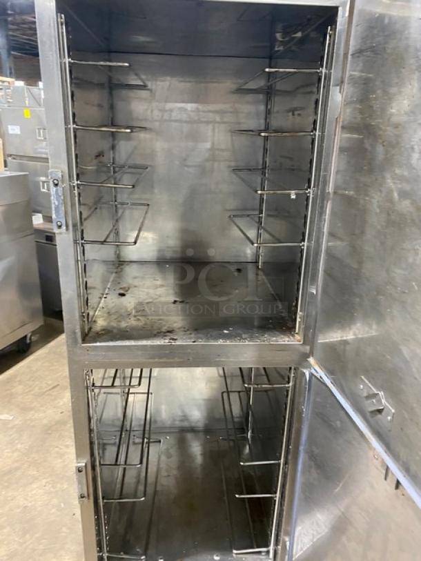 Alto-Shaam Halo Heat Series stainless steel dual-compartment heated cabinet, model 1200-UP, with universal rack and individual controls, on casters.