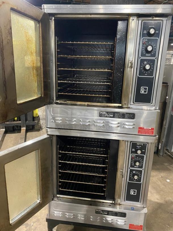 Blodgett Dual-Flow stainless steel gas convection oven, double stacked, with solid state thermostat and wired racks, on legs.