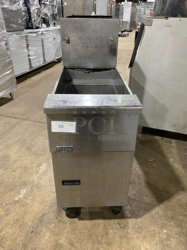 Pitco SG14S commercial stainless steel natural gas fryer, 40 lb. capacity, with back splash and casters.