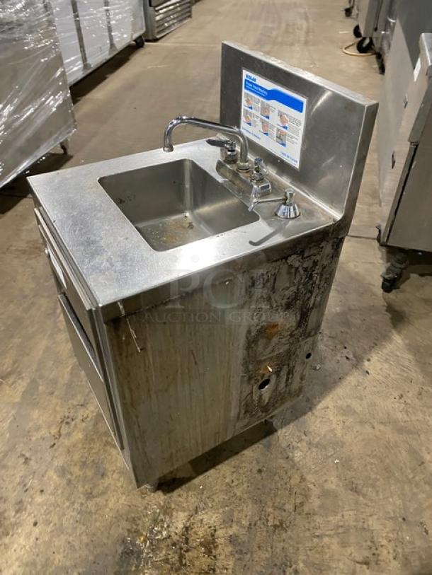 Ecolab stainless steel hand washing station with swivel faucet, soap and towel dispenser, backsplash, on legs, commercial use.