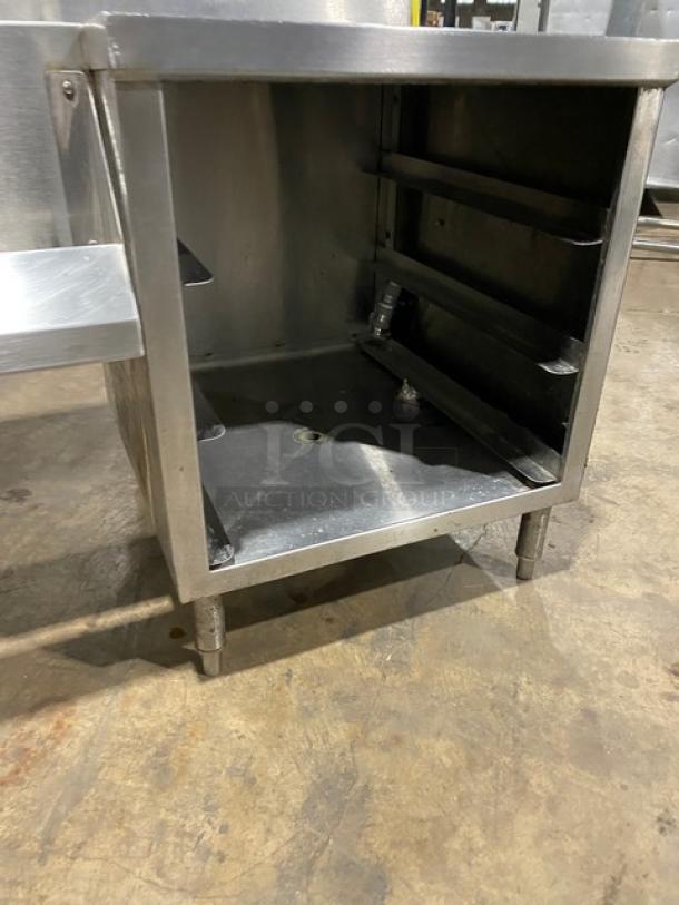Commercial stainless steel cocktail station with backsplash, integrated dump sink, swivel faucet, ice bin, speed rail, and sturdy legs.