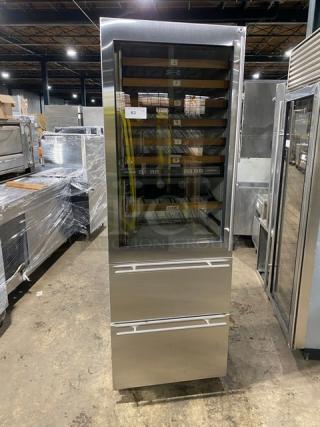 Sub-Zero 427R stainless steel refrigerated wine storage cooler with glass door and two-drawer base, commercial use.