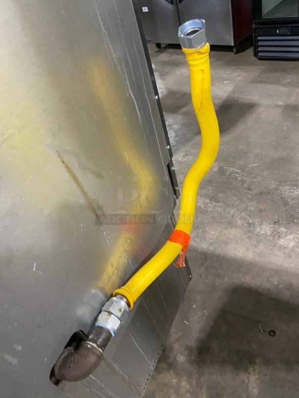 Vulcan V-Series 6-Burner Gas Range/Oven Combo, Model V6B36S, Stainless Steel, with backsplash and wired oven rack.