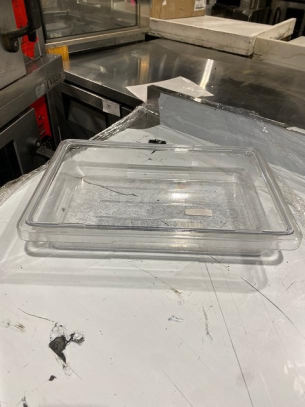 Rubbermaid Commercial clear polycarbonate 2-gal food storage pan, model FG330700CLR, new condition, rectangular shape.