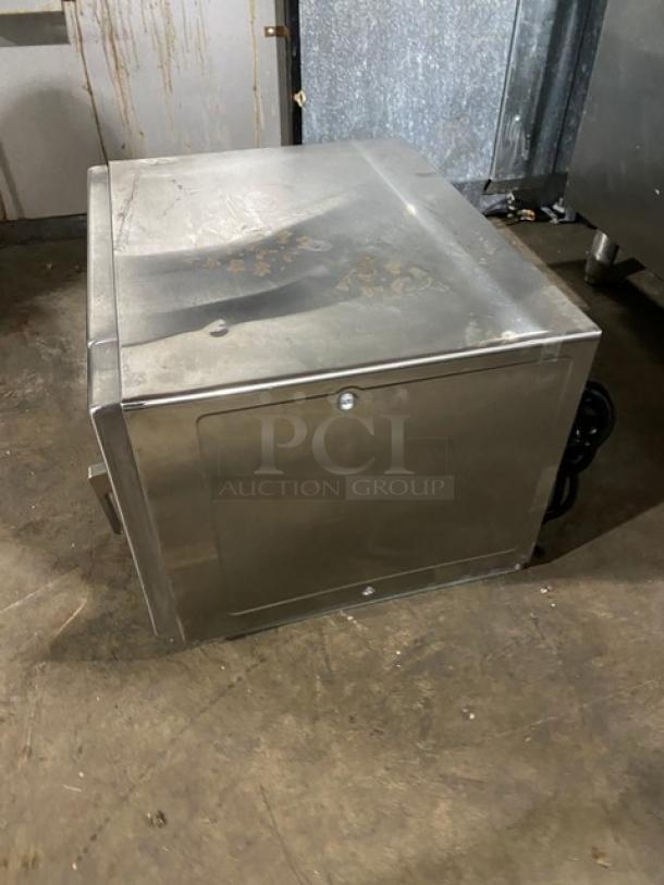 Menumaster RFS12TSW commercial stainless steel countertop microwave, digital push-button control, 120V, used condition.