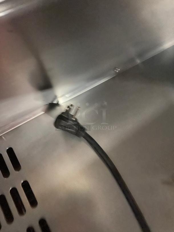 Turbo Air Super Deluxe 2-door prep table plug, Model TST-60SD-24-N, 115V, chrome rack, on casters, serial H2KM624H90768.