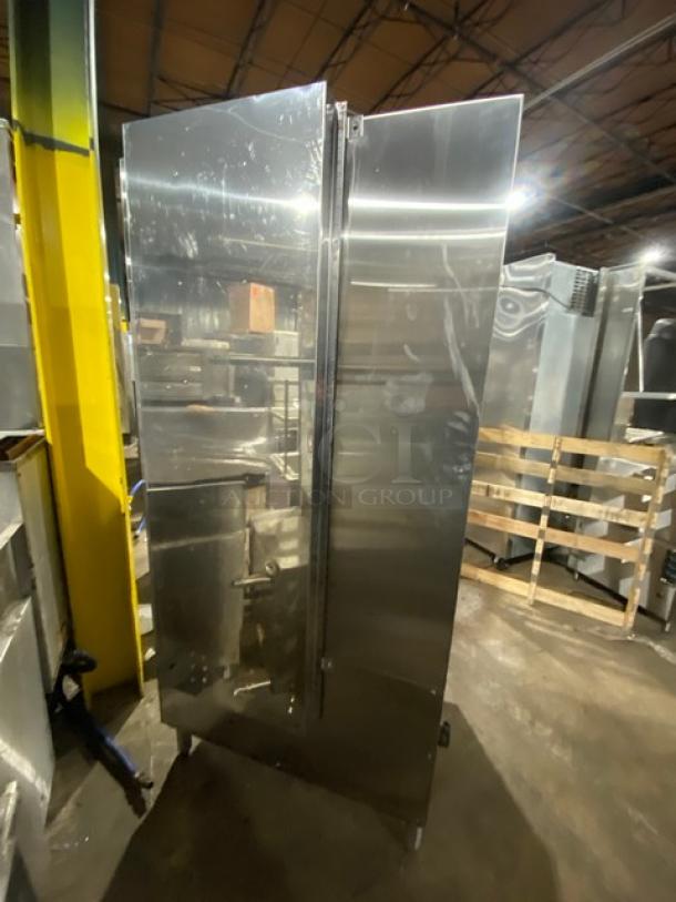 Flame-Mate stainless steel natural gas steam cabinet, model ESC3NN, 3 compartments, on legs, excellent condition.