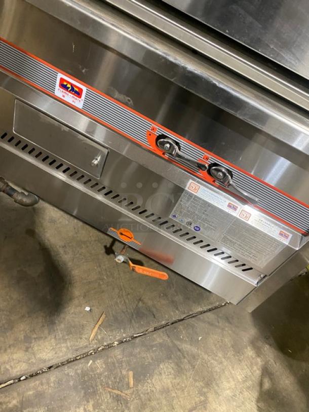 Flame-Mate ESC3NN stainless steel steam cabinet, natural gas, three compartments, on legs, control panel visible.