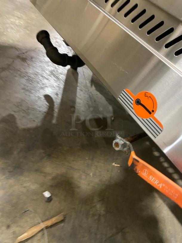 Flame-Mate ESC3NN stainless steel steam cabinet, natural gas, 3 compartments, on legs, visible vent and sticker.