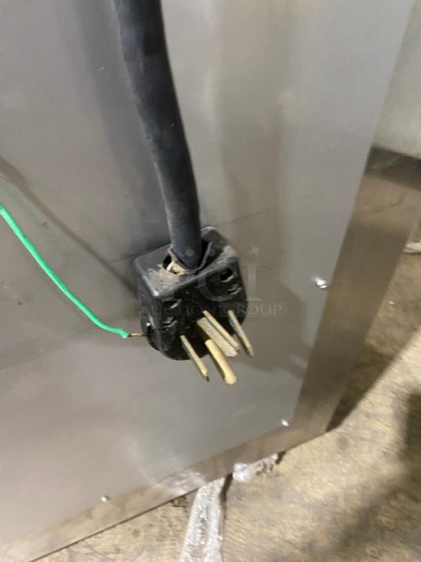 Nu-Vu Subway Style Commercial Oven/Proofer Model SUB123, stainless steel, electric, 208V 3 Phase, on casters, serial SN: 00342436060400010001, with wired oven racks, plug view shown.