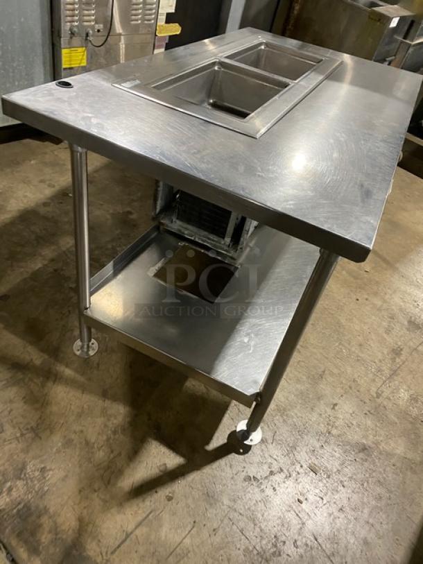 Delfield stainless steel 2-well refrigerated cold food table, model 8148EFNP, with undershelf. Electric, on legs, good condition.