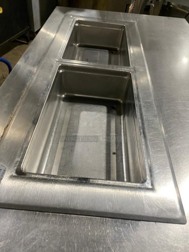 Delfield 8148EFNP stainless steel 2-well refrigerated cold food table, electric, with undershelf, on legs, good condition.