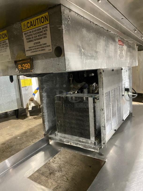 Delfield stainless steel refrigerated drop-in cold food table, Model 8148EFNP, features a narrow 2-well design, single undershelf, and R-290 refrigerant label.