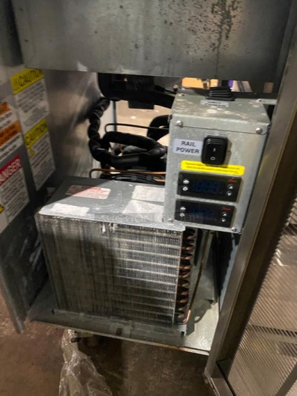 Delfield Model 18MC68PEF refrigerated food bar with 4 drawers, 5 wells, enclosed undershelf, 115V, on casters, SN: 1905150002715.