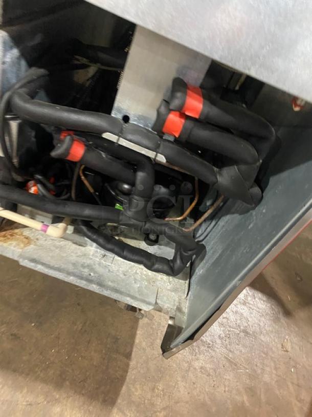 Delfield commercial stainless steel refrigerated salad bar unit, 4 drawers, model 18MC68PEF, on casters, 115V, internal wiring view.