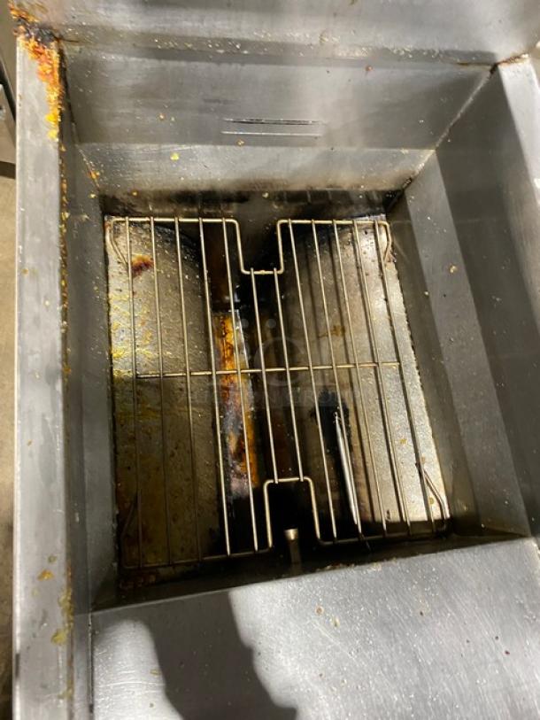 Frymaster GF40 commercial stainless steel deep fat fryer, natural gas, with backsplash and basket hanger. On casters.