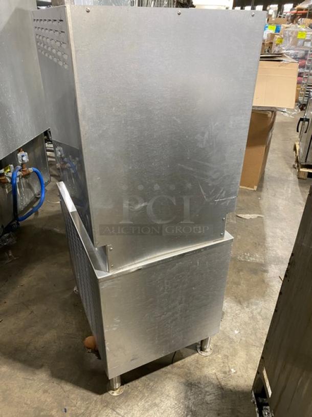 Cleveland Range Classic Series stainless steel convection steamer, model 24CEM24, with boiler base. Dual compartment, 6-pan capacity, on legs.