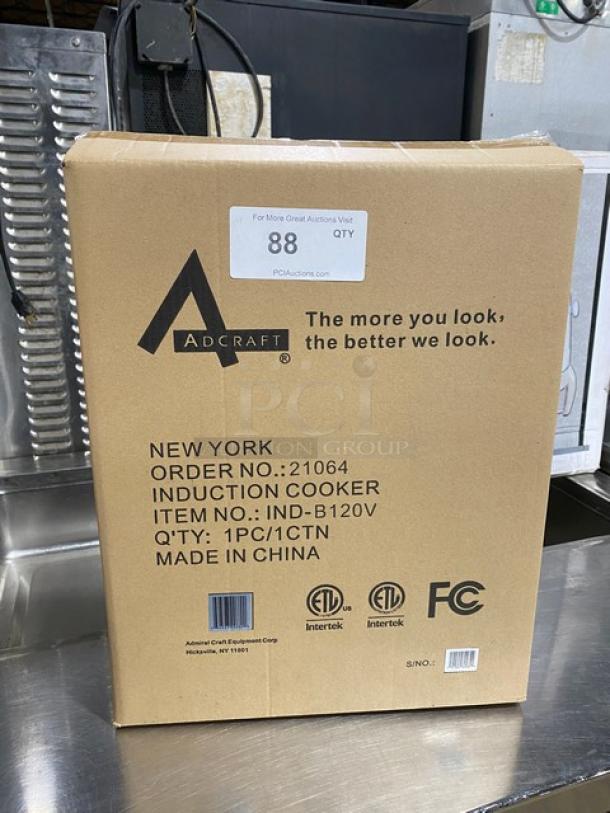 Adcraft induction burner in box, model IND-B120V, stainless steel/ceramic glass, digital controls, new condition.